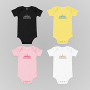 FIRST EDITION EMBROIDERED BABY ONESIE